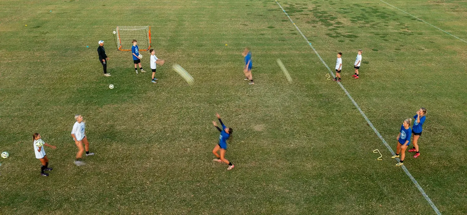 Group of young players on soccer field