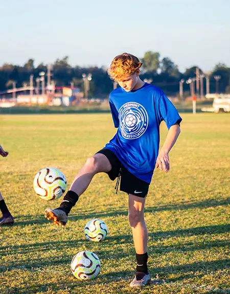 Boy playing soccer