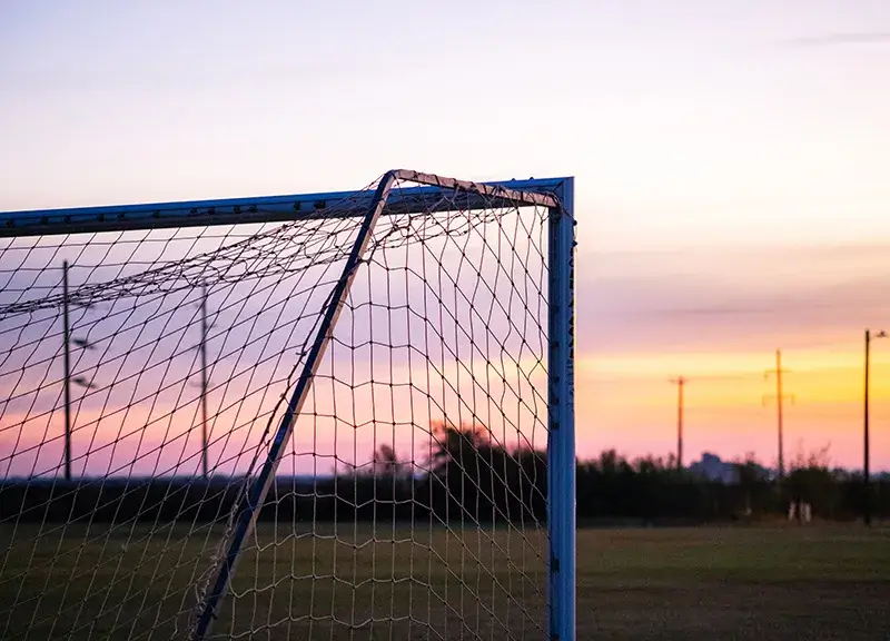 Soccer goal at sunset