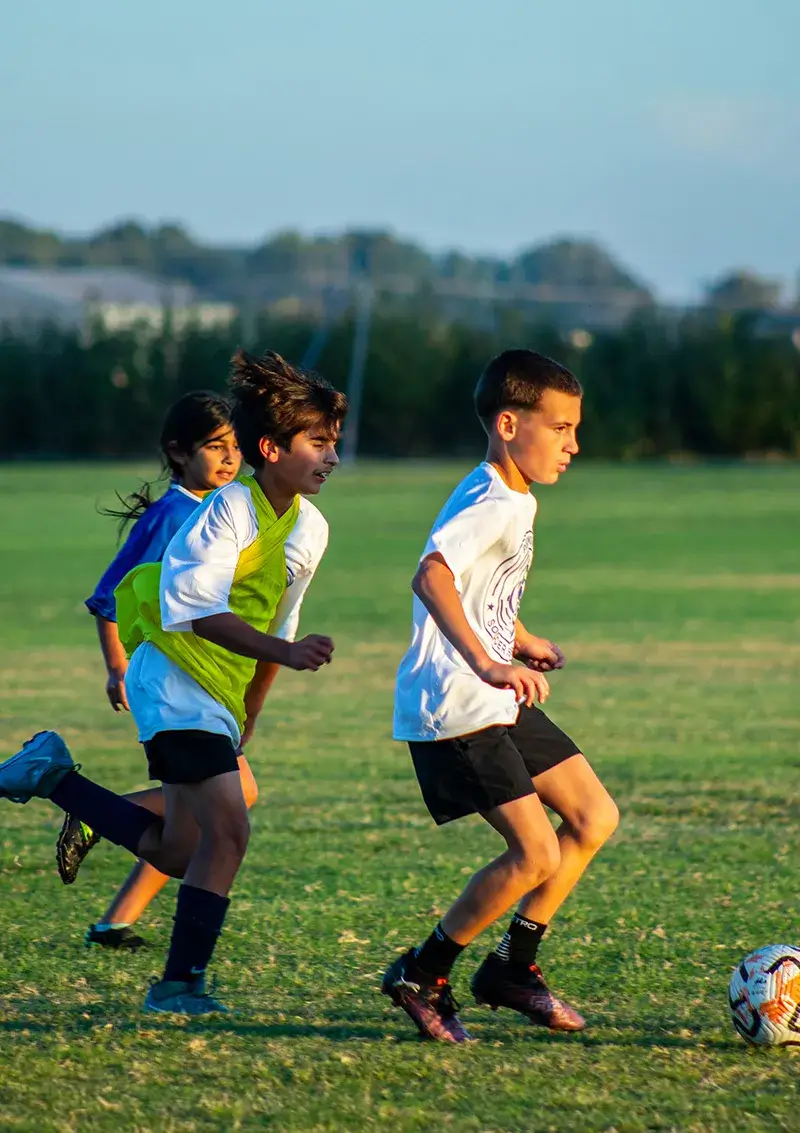 Kids playing soccer