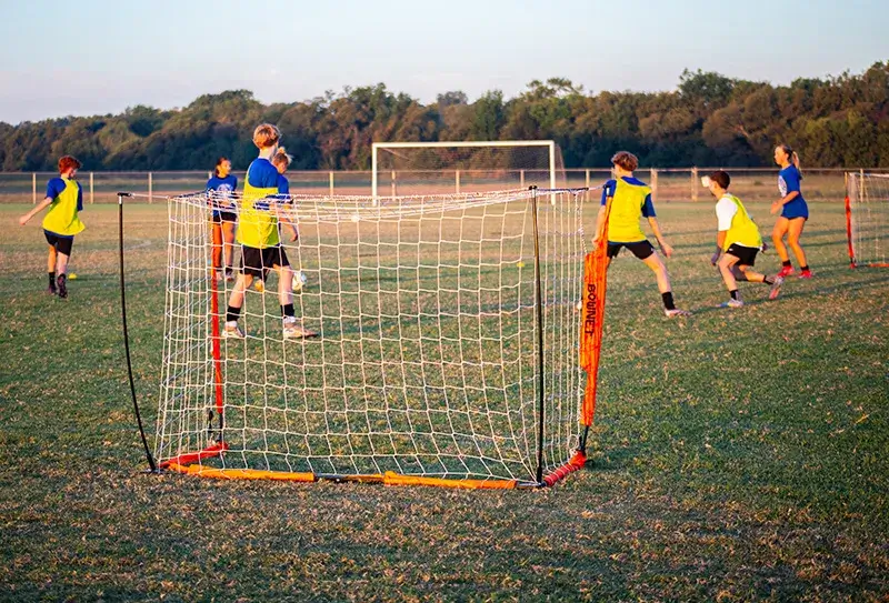 Youth athletes practicing drills