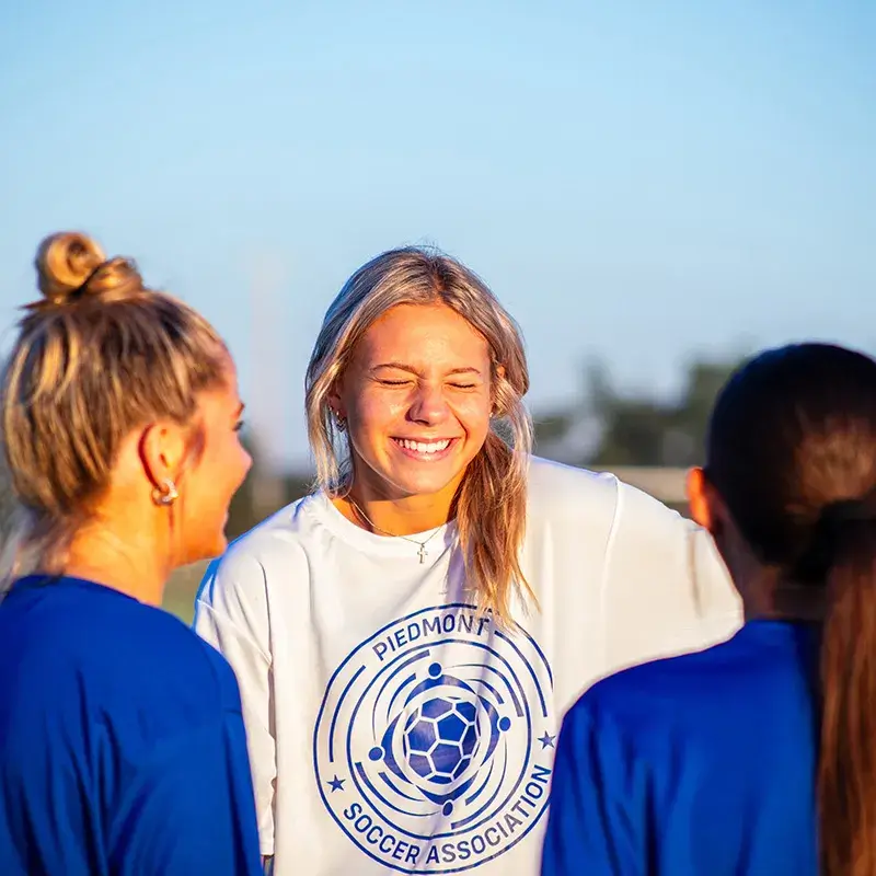 A young girl smiling
